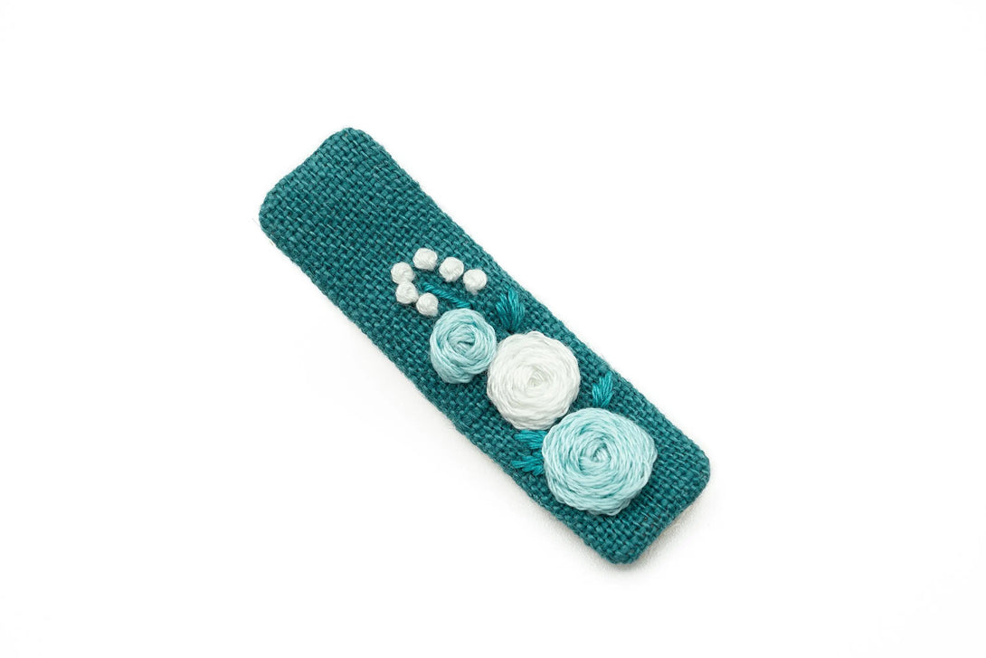 Oasis embroidered hair clip with floral designs, eco-conscious UrbaVana packaging, ideal for unique and sustainable hair accessories.