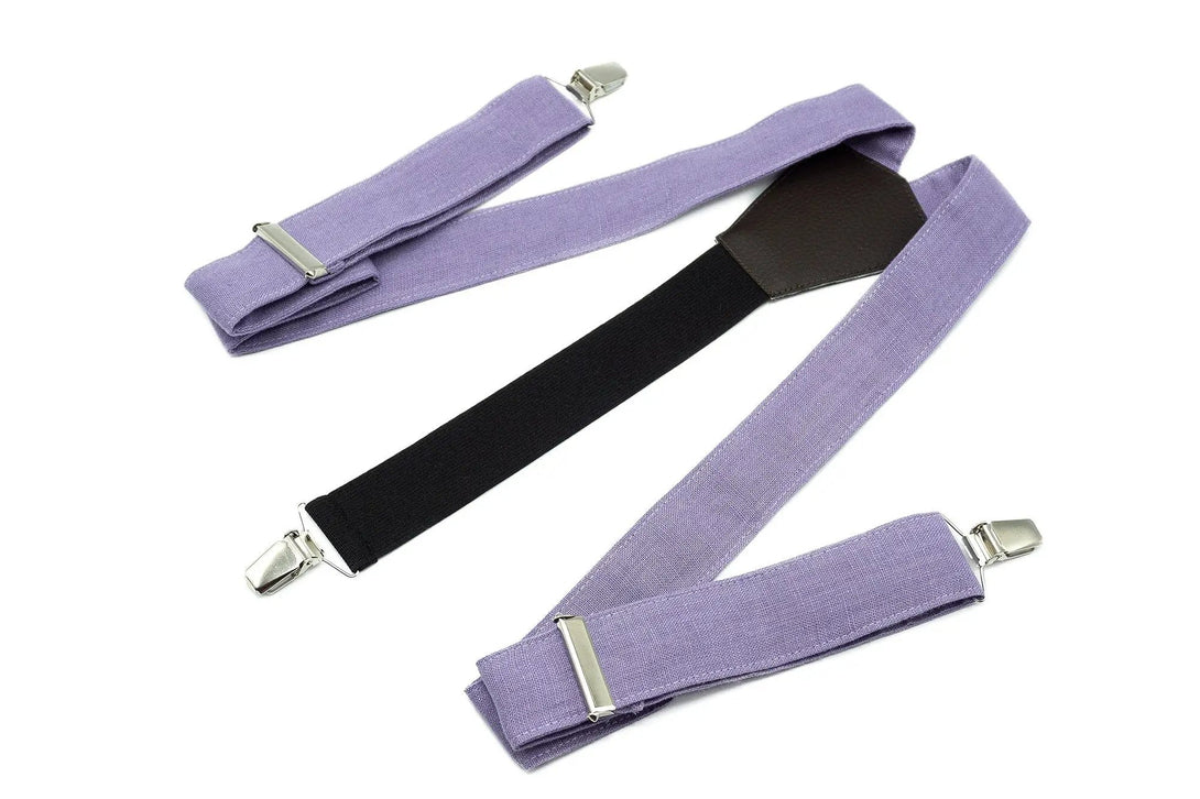 Lavender-colored suspenders with black and silver clips, matching wedding accessories for men.