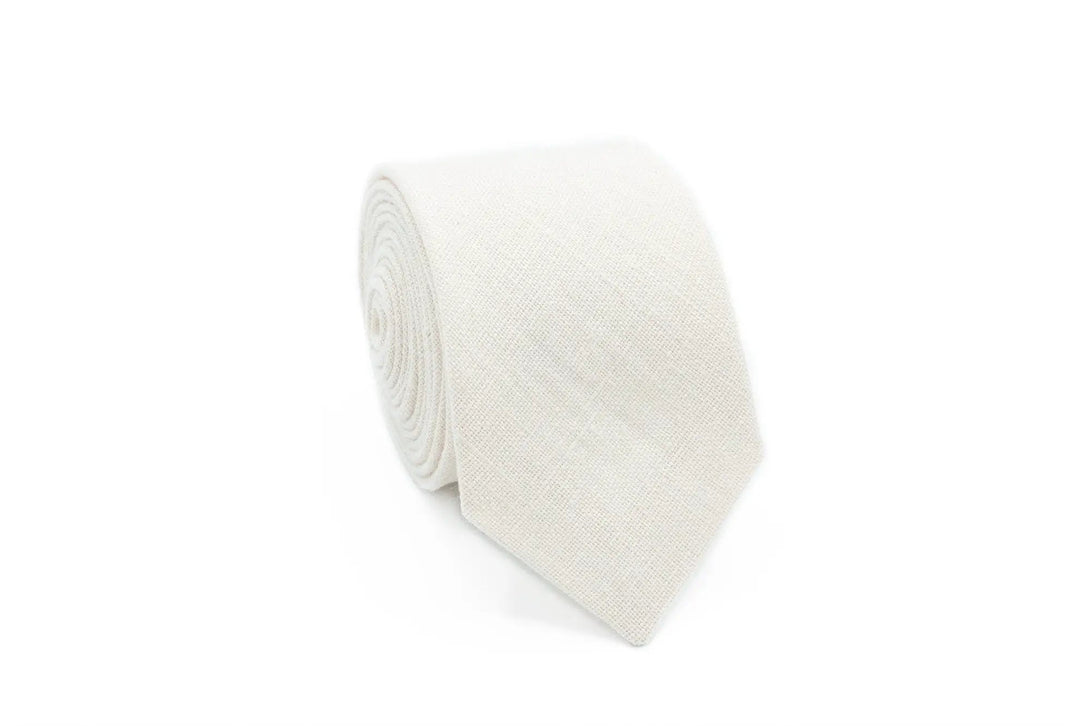 Ivory linen necktie with adjustable strap for boys, perfect for formal events and special occasions.