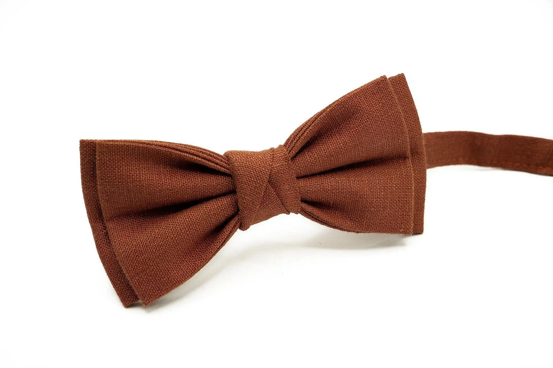 Elegant rust linen butterfly bow tie for men and boys with a matching pocket square 