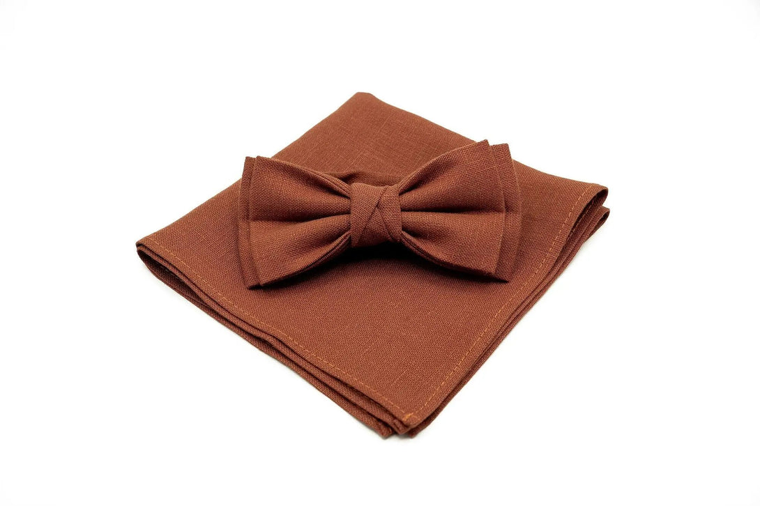 Rust-colored linen bow tie with matching pocket square for groomsmen gift