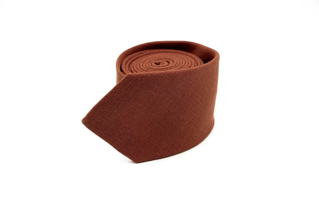 Rust linen necktie for men, perfect for weddings, available with a matching pocket square and suspender