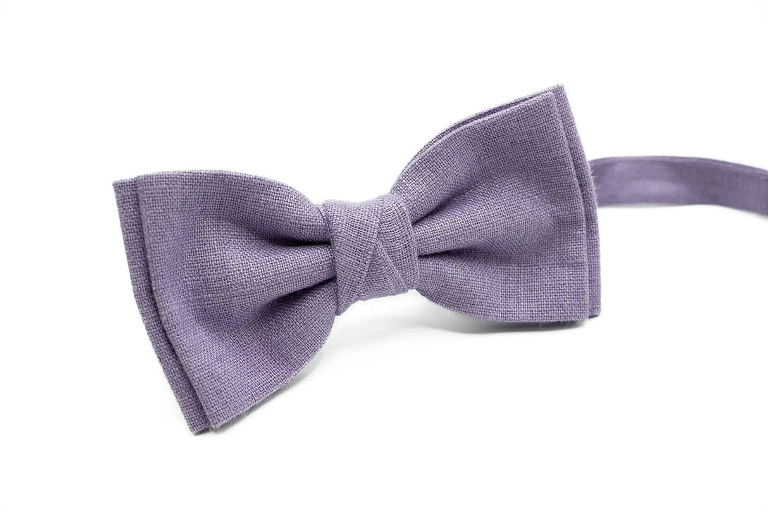 A lavender-colored butterfly bow tie made of linen fabric for men and boys