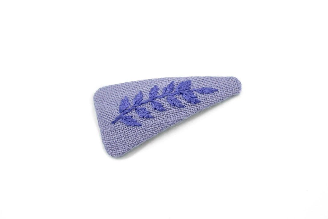 Hand-embroidered lavender floral hair clip, perfect birthday gift for women, featuring intricate purple leaf design, crafted by UrbaVana.