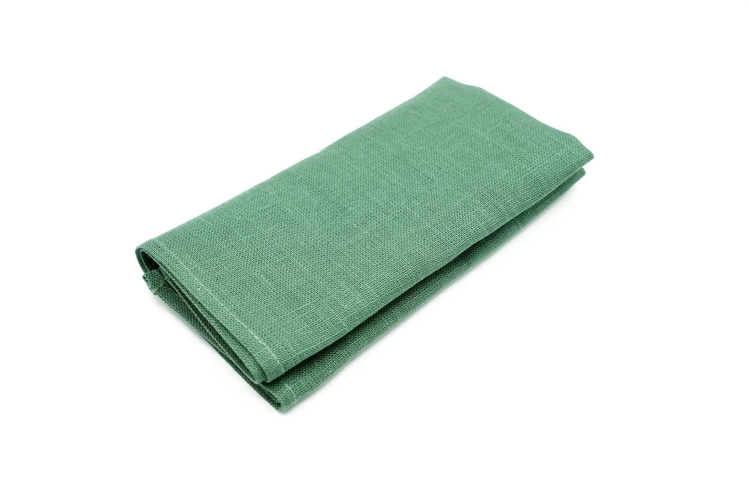 Luxurious dark sage green linen pocket square, perfect for adding a refined touch to formal attire.