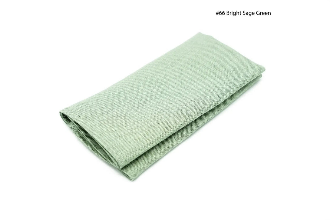 Bright Sage Green linen pocket square folded neatly for wedding or formal wear.