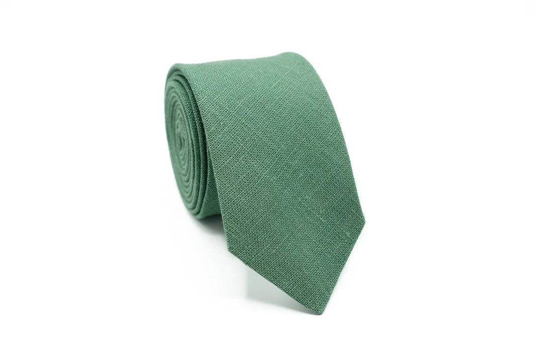 Handcrafted dark sage green linen necktie, offering a classic and modern look for weddings and formal events.