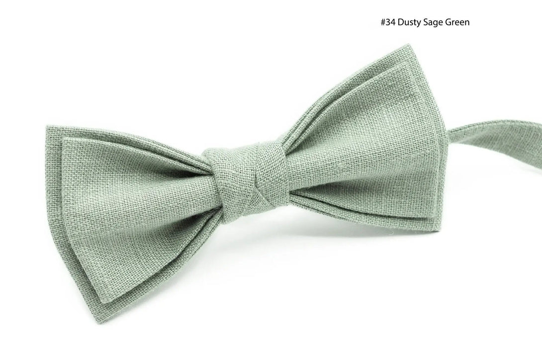 Dusty Sage Green linen bow tie for men, shown with a matching pocket square, ideal for groomsmen gift ideas.