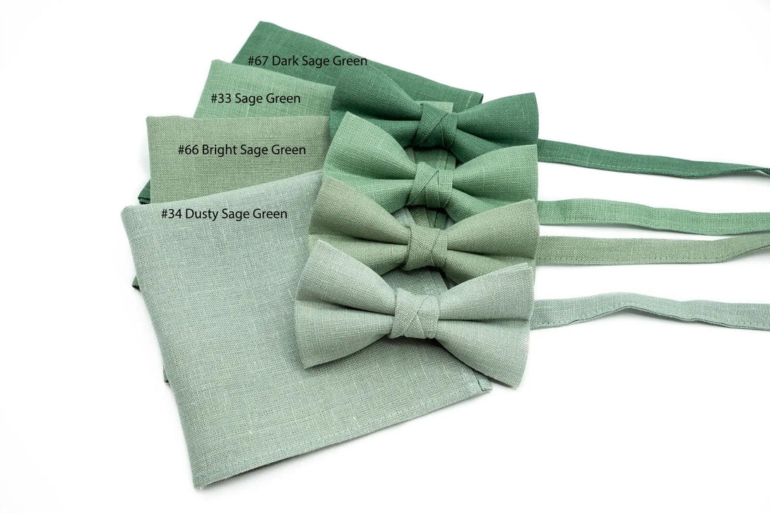 Father and son matching sage green bow ties with coordinating pocket squares in various shades.