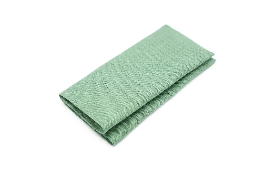 Matching sage green pocket square and linen necktie set, ideal for weddings or groomsmen gifts