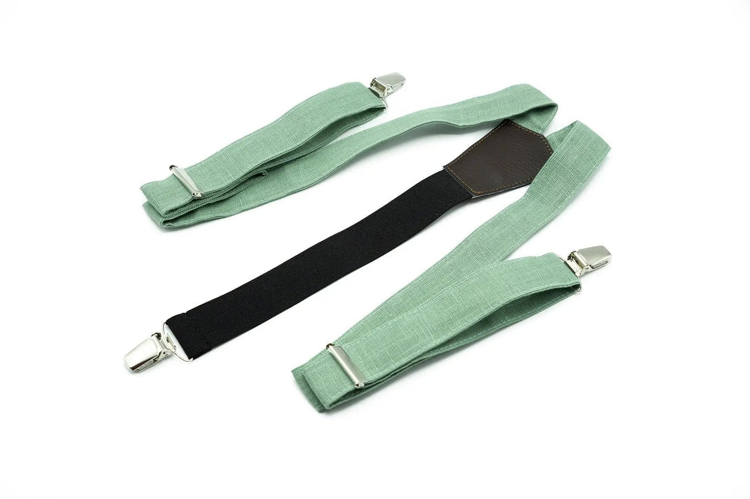 Linen Suspenders in Sage Green Color – A pair of sage green linen suspenders with adjustable straps, perfect for groomsmen or formal attire.