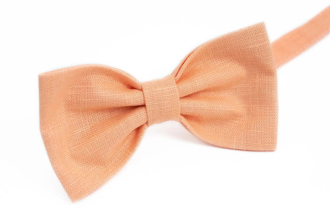 Peach color pre-tied butterfly wedding bow tie and linen skinny or slim neckties for groomsmen and groom