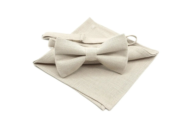 Elegant beige pre-tied bow tie and matching pocket square set for rustic or summer weddings, perfect for groomsmen and best men, showcasing a classic design and versatile color suitable for formal occasions.